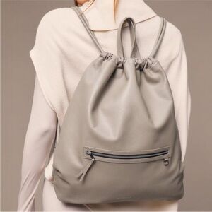 Bandolier Pebbled Leather Drawstring Backpack Greige Silver NWT